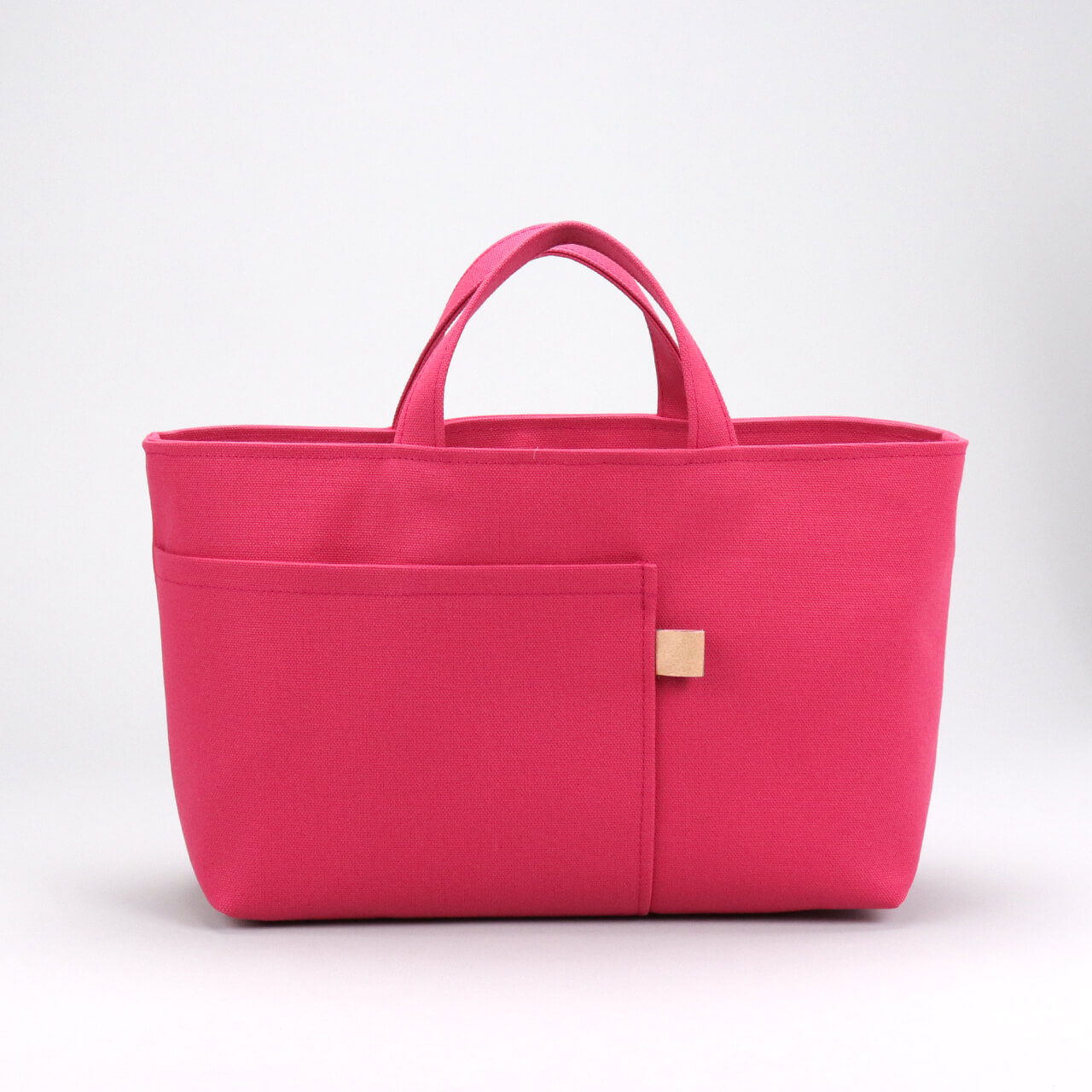 HANEANT KOBE（ハネアント神戸）のブランドタグと丁寧なステッチが特徴の富士金梅帆布シップトート　ハネアント神戸の帆布トートバッグ